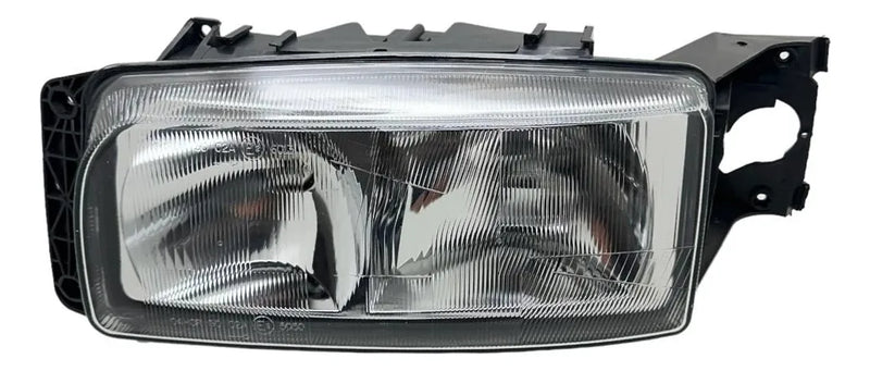 FAROL VOLVO VM AP 2004 17/23/240 ESQUERDO - 20537266 DEITADO